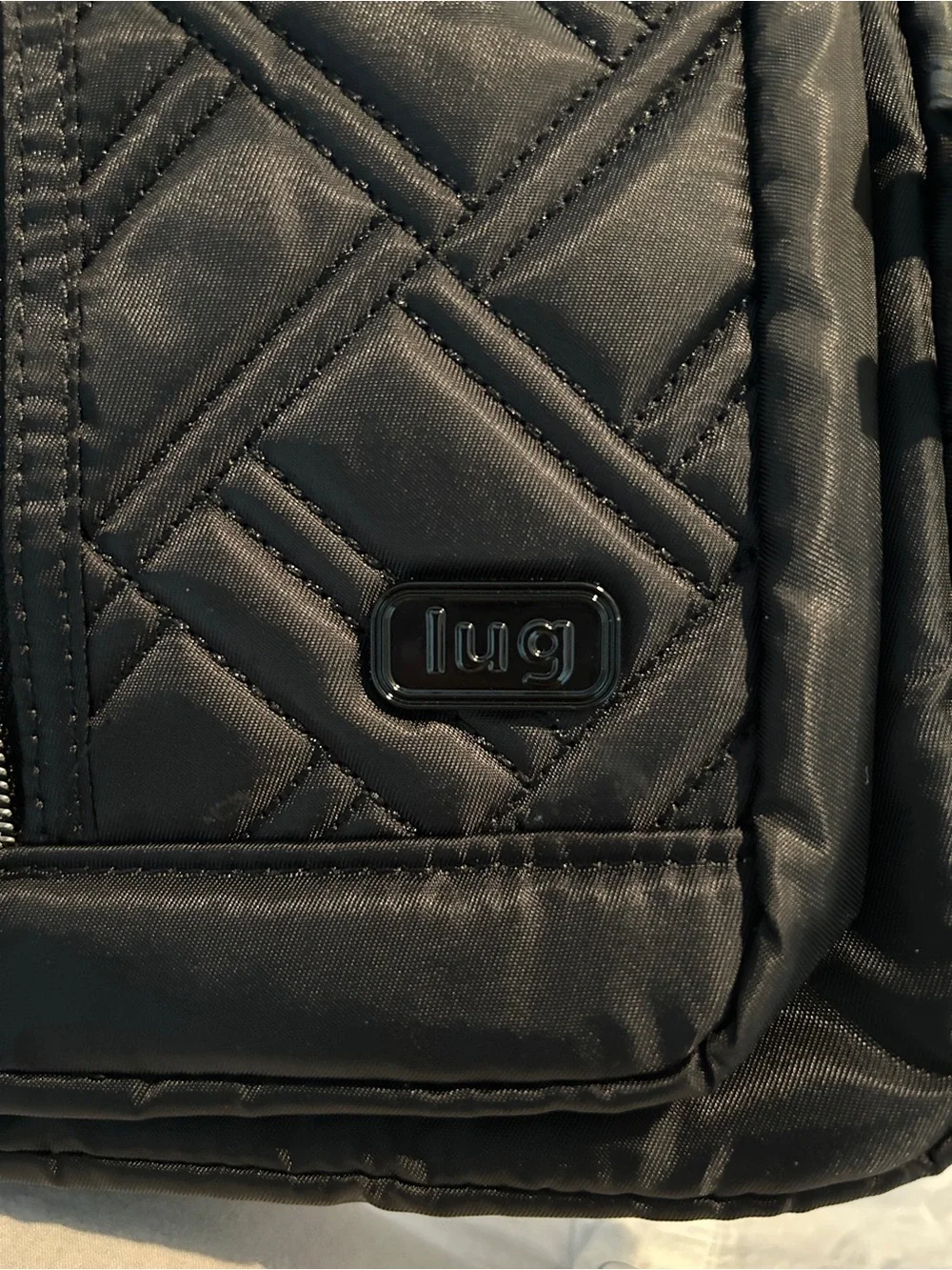 Lug Black Quilted Sling Cross-Body Backpack W/Multi-Zipped Pockets